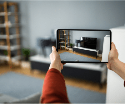 Person taking a 3D virtual tour of a home.