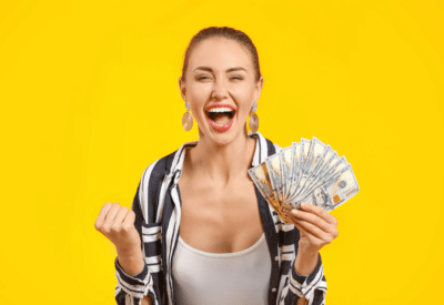 Happy women with money in her hand.