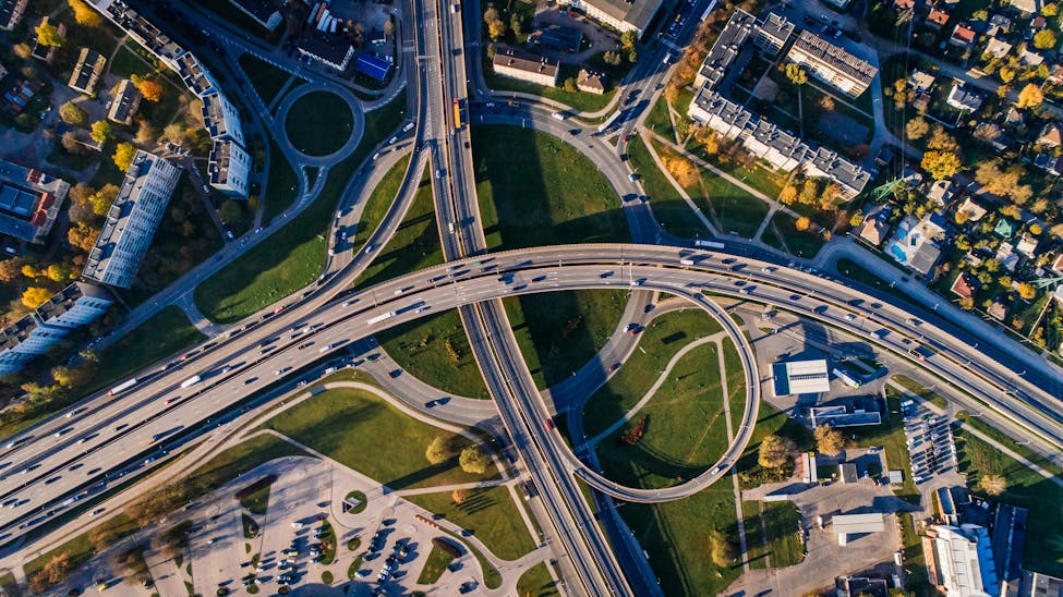 Aerial shot of a complex highway intersection in the Triangle region showcasing the increase in population.