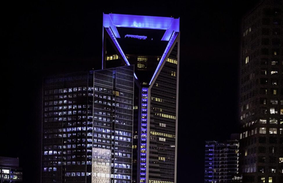 Stunning night view of Duke Energy Center in Charlotte, NC, showcasing the population boom arriving daily.