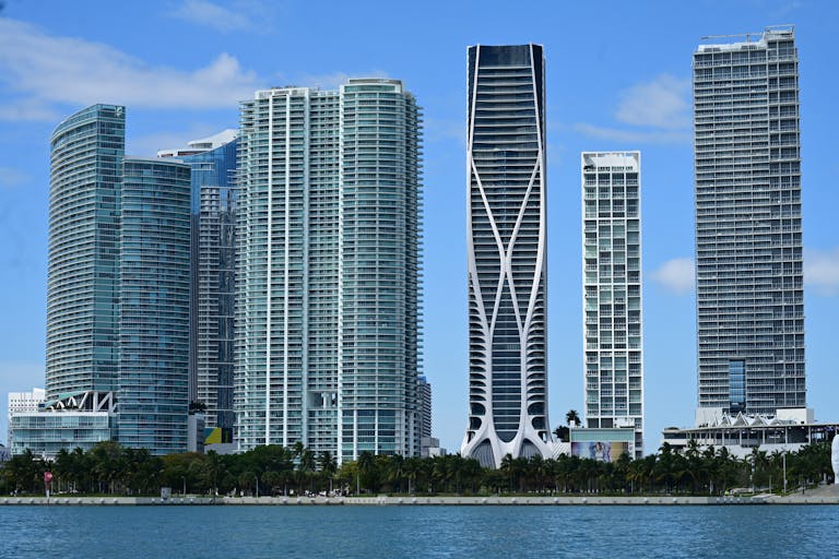 Captivating view of iconic skyline featuring modern skyscrapers by the waterfront.