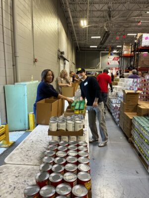 MoveZen Property Management Charlotte team volunteering at Second Harvest Food Bank of Metrolina