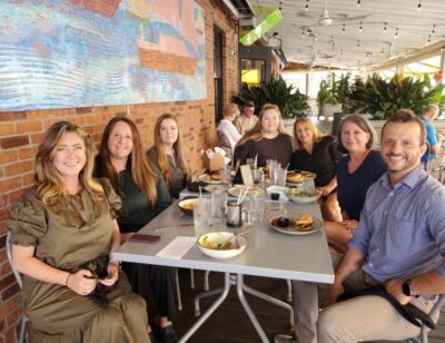 MoveZen Property Management Wilmington team at lunch in 2022