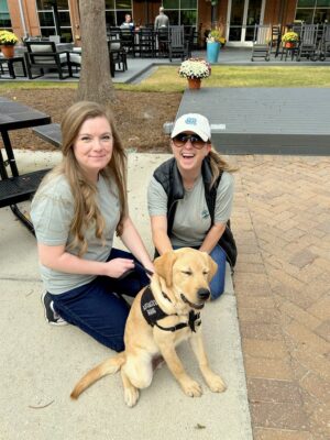 MoveZen COO Alisha and Kathleen with a Paws4People assistance puppy in training, Wilmington, NC