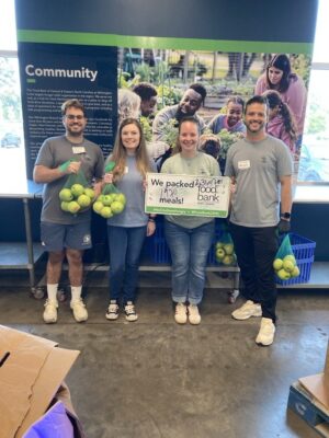 MoveZen Property Management team volunteering at the Food Bank of Central & Eastern North Carolina in Wilmington, NC